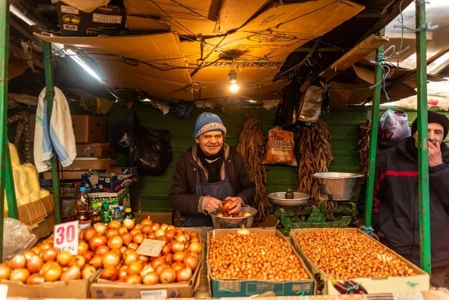 A shopkeeper at his stall in Lahore